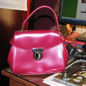 Beijo Purse, Hot Pink is being swapped online for free