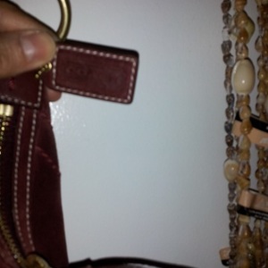 COACH large burgundy suede hobo bag is being swapped online for free