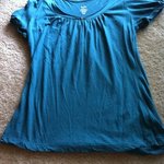 teal flowy top is being swapped online for free