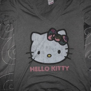Grey v-neck Hello Kitty tee size medium is being swapped online for free