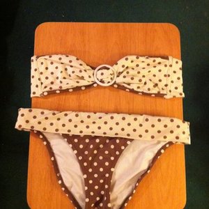 Victoria's Secret Polka Dot Halter/ Strapless Swimsuit L Top, M Bottoms is being swapped online for free