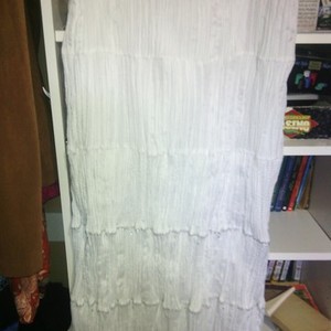 WHITE & SILVER BROOMSTICK STYLE LONG SKIRT is being swapped online for free