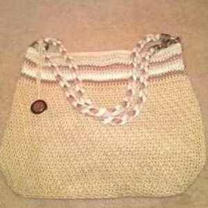 THE SAK TAN CROCHET PURSE NEW is being swapped online for free