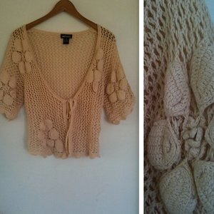 Wetseal peachy cream shrug size m  is being swapped online for free
