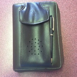 Leather wallet/organizer/cell phone holder is being swapped online for free