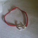 Red anchor bracelet   is being swapped online for free
