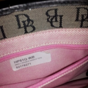 Dooney & Bourke Signature Double Handle Tote is being swapped online for free