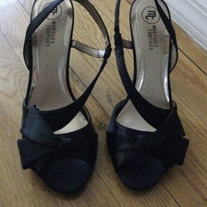 Black Heels with Bow (8.5) is being swapped online for free