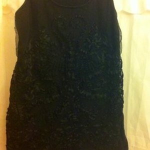 Black tunic tank medium is being swapped online for free
