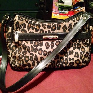 CUTE ANIMAL PRINT PURSE is being swapped online for free