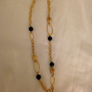 Black and Gold Necklace is being swapped online for free
