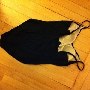 Black one piece bathing suit  is being swapped online for free