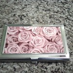 PREETY RED ROSE METAL BUISNESS CARD HOLDER is being swapped online for free