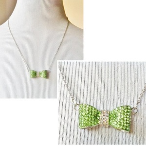 NWOT Green Bow Rhinestone Necklace is being swapped online for free