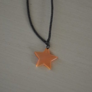 Star necklace in orange is being swapped online for free
