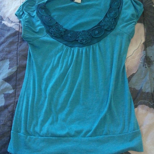 Teal Blouse is being swapped online for free