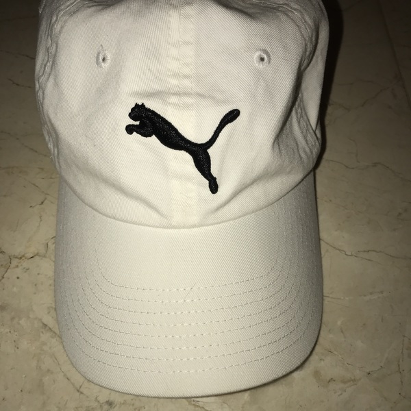 White Puma women's sized hat. Never been worn is being swapped online for free
