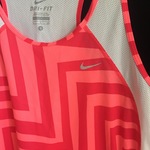 Nike dry fit running top size S is being swapped online for free