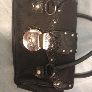 Guess purse  is being swapped online for free