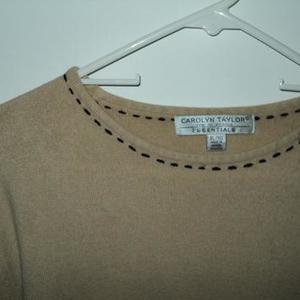 XL camel light sweater is being swapped online for free