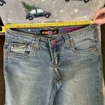 CUTEST DOLLHOUSE FLARE JEANS WITH RED STITCHING AND CUTE BUTTONS is being swapped online for free