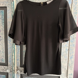 Black Coast top size 10 is being swapped online for free